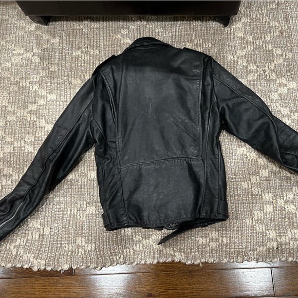 Black leather bikers jacket by Brooks. New $450. Size 36 missing buckle. - Picture 2 of 3